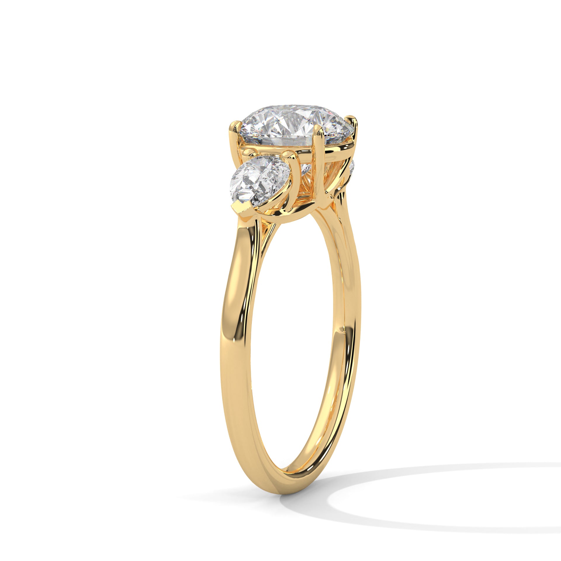 Round and Pear Three Stone Ring