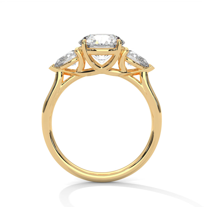 Round and Pear Three Stone Ring
